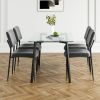 Modern simple table with a glass square table and four chairs. Transparent tempered glass countertop, black metal legs