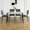 Modern simple table with a glass square table and four chairs. Transparent tempered glass countertop, black metal legs
